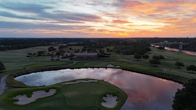 Grande Dunes Red Sky Over 18 Green with Clubhouse