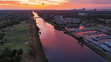 Grande Dunes Red Sky Over 9 and Waterway